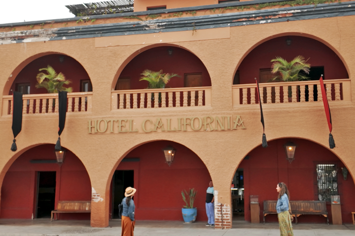 a group of people standing in front of a building