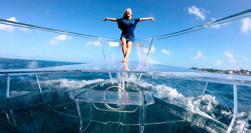a person riding on the back of a boat