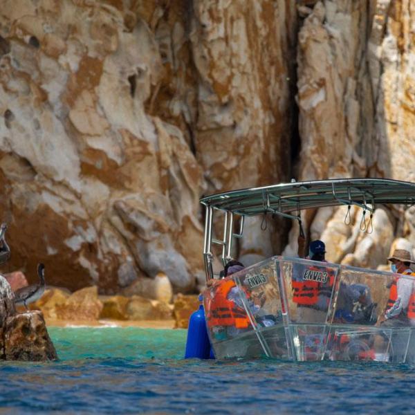 a group of people on a rock